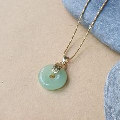 DESCRIPTION: This dainty round jade pendant necklace features a beautiful green gemstone coin set in gold. Perfect for everyday wear, it adds a touch of elegance and makes an ideal gift for friends or loved ones. BEST FEATURES: Genuine round jade gemstone for a vibrant, natural look. Gold setting adds a luxurious and timeless appeal. Dainty coin pendant for a minimalist style. Versatile design, ideal for layering or wearing solo. Lightweight and comfortable for daily wear. ADVANTAGES: Jade is kn Jade Pendant Necklace, Customer Gifts, Necklace Elegant, Coin Set, Necklace Green, Jade Necklace, Jewelry For Her, Green Gemstones, Green Necklace