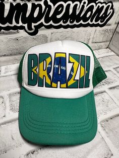 Support your team when Brazil and Mexio play each other. Game Day Team-colored Trucker Hat With Letter Print, Team-colored Trucker Hat With Letter Print For Game Day, Hip Hop Trucker Hat For Baseball Season, Sports Fan Baseball Cap With Team Logo, Green Trucker Hat For Baseball Season, Green Snapback Trucker Hat For Sports Events, Baseball Season Fan Merchandise Baseball Cap, Team-colored Trucker Hat For Sports, Sports Fan White Trucker Hat