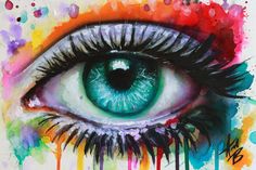 an eye with colorful paint splatters on it and the eyes are painted in different colors