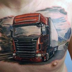 a man's chest with a large truck tattoo on his chest and the image of a red semi - truck