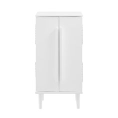 a white cabinet with two doors and legs