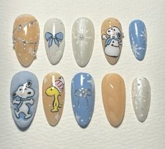 #snoopy #snoopynails #winternails #snoopywinter #christmasnails #cutenails #bluenails #nailinspo #snoopybluensils #naildesign #pressonnails Frosty The Snowmen Nails, Snoopy Nail Art Christmas, Xmas Inspired Nails, Snoopy Xmas Nails, Winter Miffy Nails, Snoopy And Woodstock Nails, Lilo And Stitch Christmas Nails, Charlie Brown Nails Christmas, Snoopy Winter Nails