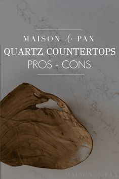 a close up of a wooden object on a white surface with text that reads maison 6 pax quartz countertops pros + cons