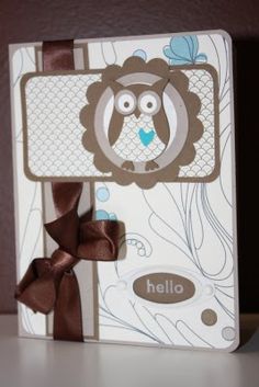 an owl card with a brown bow on it