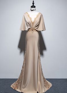 Beige V-neck Evening Dress For Wedding, Fitted Beige Gown For Banquet, Gold V-neck Evening Dress With Sweep Train, Beige Evening Dress With Sweep Train For Party, Beige Evening Dress For Banquet And Prom, Elegant Cream Evening Dress For Prom, Beige Evening Dress For Banquet And Prom Season, Beige Evening Dress With Sweep Train For Banquet, Beige Party Dress With Sweep Train