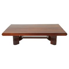 a wooden table sitting on top of a white background