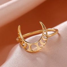 Let your style shine with this Crescent Moon Phases Witch Ring. Crafted from stainless steel and with a sleek 2mm width, this ring comes in a classic steel or gold color. Featuring a crescent moon and the different phases of the moon, this is an eye-catching piece that's perfect for everyday wear 🔮. Witch Ring, Moon Phase Jewelry, Moon Phase Ring, Lunar Jewelry, Wicca Jewelry, Witch Rings, Lunar Moon, Wiccan Necklace, Crescent Moon Ring