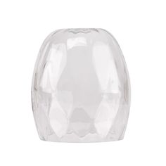 a clear glass vase sitting on top of a white table