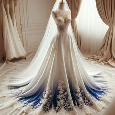 a wedding dress is displayed on a mannequin in front of curtained windows