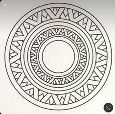 a black and white drawing of a circle with geometric designs on it's surface