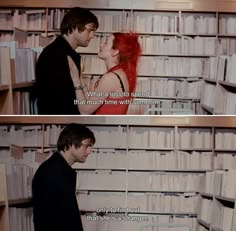 two people standing next to each other in front of bookshelves with words on them