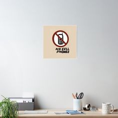 there is no cell phones sign on the wall in this office room poster printable