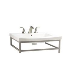 a white sink with two faucets on it's sides and a metal stand