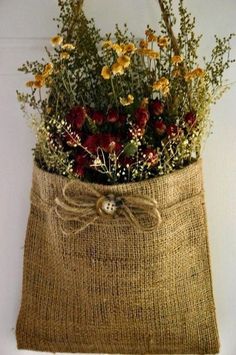 a burlock bag with flowers in it