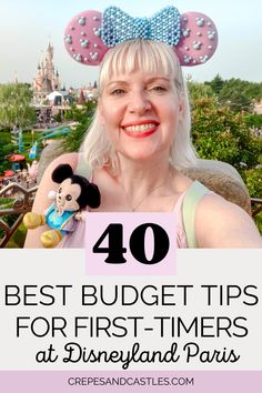 a woman with blonde hair and minnie ears on her head in front of disneyland park