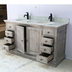 a double sink vanity with two mirrors and drawers on it's sides, against a white background