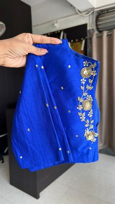 Product Descriptions : Royal blue silk blouse comes with intricate floral motif hand work for back & tikki works all over the blouse as shown View this post on Instagram A post shared by Handcrafted Sarees by Shobana Nithin (@threadslabel_india) Silk Salwar Kameez With Dori Work For Reception, Unstitched Cotton Silk Choli With Dori Work, Semi-stitched Silk Blouse Piece With Dabka Work, Wedding Cotton Silk Blouse Piece With Dori Work, Festive Blue Tissue Silk Blouse Piece, Bollywood Style Blue Cotton Silk Choli, Blue Silk Traditional Wear With Dori Work, Blue Dola Silk Kurta With Pallu, Silk Traditional Wear With Unstitched Blouse For Reception