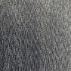 an old black and white photo of some sort of fabric or material that looks like denim