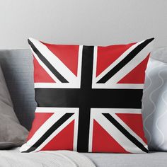 a red and black union jack flag throw pillow