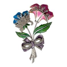 This is part of Chairish’s Costume Jewelry assortment.  A wonderful Art Deco period brooch in sterling silver. The bouquet consists of a pink and blue enamel flower decorated with marcasite. There are two green leaves, and it is tied with a lavender enamel bow. The piece is marked sterling on the back and is in excellent condition.   Dimensions: Length: 2 7/8", Width: 2", Weight: 29.9 grams Silver Victorian Enamel Brooches, Victorian Silver Enamel Brooches, Silver Enamel Pin For Wedding, Silver Enamel Wedding Pin, 1920s Art, 1920s Art Deco, Art Deco Period, Enamel Flower, Floral Bouquets