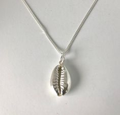 i picked this shell up on Bingin Beach Bali~ I made a mould of the shell so i could make a replica of the shell in sterling silver. The height of the shell is 16mm and it comes on a 45 cm sterling silver chain. Beachy Silver Jewelry, Silver Sterling Silver Shell Pendant Necklace, Silver Sterling Silver Pendant Shell Necklace, Sterling Silver Shell Necklace For Gift, Handmade Sterling Silver Shell-shaped Necklace, Handmade Sterling Silver Shell, Silver Beach Jewelry, Bingin Beach, Bali Jewelry