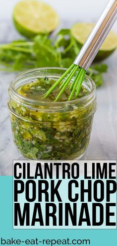 a jar filled with marinade next to limes and cilantro lime pork chop marina