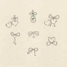 six bows and hearts drawn in ink on paper