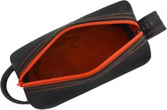 a black and orange case with an orange zipper on the inside is open to show it's contents