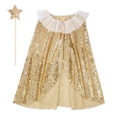 This gorgeous gold cape is a fabulous way to look extra special for any party or celebration. It's also ideal for imaginative play on any day. It's beautifully crafted from a lined gold sequin fabric, with an elegant white tulle collar. It comes with a gold sequin star wand, perfect to majestically wave around. 3-6 years tiara sold separately Lined gold sequin fabricWhite tulle collar with popper fastenerSequin star wand with tasselSuitable for ages 3+Product dimensions: Neck - 17 inches, Length Tulle Collar, Gold Sequin Fabric, Sequin Cape, Cape Costume, Flower Headdress, Star Wand, Princess Dress Up, Meri Meri, White Tulle