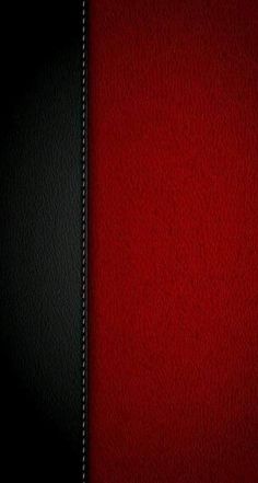 a black and red wall with a white stripe