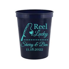 a blue plastic cup with the words reel lucky and sheryl & bon on it