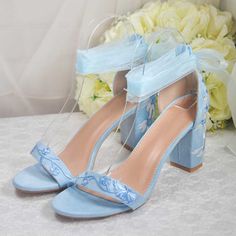 Elegant and vibrant, these blue vegan suede floral embroidery ankle strap heeled wedding sandals exude charm. Perfect for brides seeking a touch of uniqueness and sophistication on their special day. Color: Blue Material: Vegan suede Heel Type: Block heel Heel Height: 3.15'' / 80 mm approx Product measurements were taken using size 8. Please note that measurements may vary by size. Toe: Open toe Flora embroidery design Lace-up ankle strap design Handcrafted US sizing. Fits true to size. Blue Strappy Heels, Light Blue Heels, Blue Wedge Heels, Blue Block Heels, Blue Bridal Shoes, Cowboy Shoes, Dance Heels, Blue Wedding Shoes, Boots Square Toe