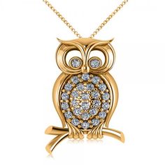 an owl necklace with diamonds on it