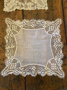 "This  hanky/doily is a lovely piece of hand done lace made in the 1800s.  Lace is in very nice condition.  A beautiful bridal gift and keepsake.  This could be used as a doily too.   13\" square.  It is a very light cream, almost white ." Lace Doily, Lace Wedding Handkerchiefs With Lace Work, Wedding Handkerchiefs With Lace Work, Lace Handkerchiefs With Lace Trim For Wedding, Wedding Lace Handkerchief With Lace Work, Elegant Lace Handkerchiefs With Lace Trim, Lace Wedding Handkerchiefs With Lace Trim, Vintage Handmade Wedding Handkerchiefs, Vintage Lace Trim Handkerchiefs As Gift