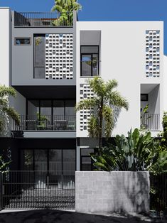 an apartment building with multiple balconies and windows