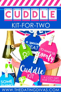 the cuddle kit for two is in pink, white and blue with some tags on it