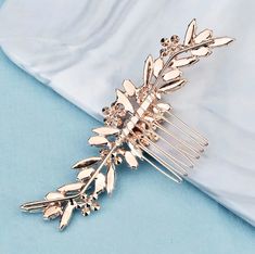 Delicate and romantic, this floral hair comb is the perfect accessory for your special day. Adorned with a combination of glowing Swarovski pink opals and sparkly clear crystals on a rose gold base, it will give your hair an extra touch of glam to finish off your perfect look on your perfect day. Height: 2" (approx. 5cm); Width: 4.5" (approx. 11.5cm); Weight: 23g. Cast in lightweight alloy and rose gold plated for a flawless finish, the hair comb is hypoallergenic - lead, nickel and cadmium free Gold Bridal Hair Comb, Floral Hair Comb, Beautiful Bridal Hair, Floral Hair Combs, Rose Gold Bridal, Bridal Hair Comb, Colored Wedding Dresses, Clear Crystals, Floral Hair