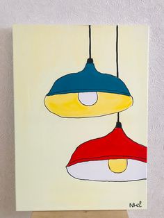 an acrylic painting of two lamps hanging from hooks on a wall, one is yellow and the other is red