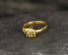 Gold Elephant Ring in Dainty design made of Gold Vermeil ☞ thickest 18k Gold Plating on top of Solid 925 Sterling Silver ☞ made to last. Matching Earrings - please ask meMatching Pendant - please ask me Details:♥ Gold Elephant Ring♥ Dimensions: Band width ≈ 1.8mm, thickness ≈ 1.2mm♥ 18K Gold Vermeil Elephant Ring Gold, Elephant Rings, Elephant Ring, Gold Elephant, Rings Gold, Gold Plated Rings, Dainty Ring, Dream Jewelry, Ring Band