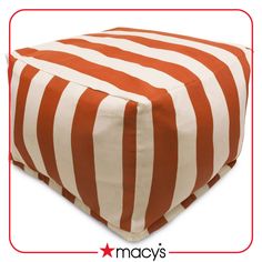 an orange and white striped ottoman cover