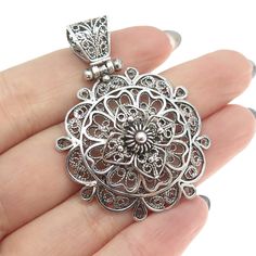 Great vintage condition.  925 Sterling Silver Vintage Cannetille & Filigree Floral Pendant  Weight: 8.7g   WELCOME TO PAWN SHOP We are an actual pawn shop and have been in business for over 25 years. Since 1990, our establishment has been serving a variety of clients by providing them with short term cash solutions and options of liquidity regarding their treasured heirlooms. Acknowledging that today′s customers are very sophisticated and are looking for a variety of investments, our acquisition Silver Filigree Jewelry, Filigrana Jewelry, Vintage Silver Jewelry, Marcasite Jewelry, Metal Clay Jewelry, Filigree Jewelry, Antique Gold Jewelry, Gold Rings Fashion, Floral Pendant