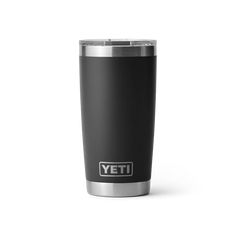 the yeti travel mug is shown in black and silver, with white lettering on it