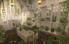 a living room filled with lots of plants and windows