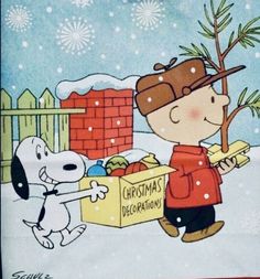 a charlie brown christmas card with a dog and a box full of presents in the snow