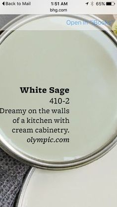 white sage on the walls of a kitchen with cream cabinetry and olympic com logo