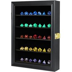 a display case filled with lots of different colored and shaped dices on black shelves