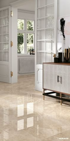 a living room with marble floors and white walls