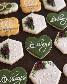 decorated cookies are arranged in the shape of hexagonals with names on them