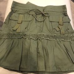 I Think I Bought At H&Mcotton Skirt With Cute Details. Has Zipper And A Hook & Eye Too Closure But Also An Actual Functioning Drawstring To Adjust For A Perfect Fit. Fits Hips Then Looser By Thighs. Don’t Think My Daughter Ever Wore Just Removed Tags. Looks Brand New. Size 4 Casual Mini Skirt With Drawstring, Cotton Mini Skirt With Drawstring, Casual Cotton Skirt With Drawstring, Drawstring Mini Skirt For Day Out, Green Mini Cargo Skirt In Cotton, Spring Cotton Mini Skirt With Drawstring, Casual Drawstring Cargo Skirt For Summer, Casual Cargo Skirt With Drawstring For Summer, Casual Summer Cargo Skirt With Drawstring