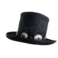 Make a chic style statement with Leather Skin shop’s Top hat. This hat is made from genuine leather (cowhide), giving it a smooth and luxurious feel. What’s more? The Top hat is comfortable to wear. Available in an affordable price, it makes for the perfect accessory to any outfit. Some of the things that set this hat apart: The band of the top hat is lined with metallic embellishments, giving it a fancy and attractive look. The flat crown of the hat and the slightly curved brim adds to the sophistication and class. It is available in many various sizes, and you can choose the one that best fits you. The high-quality full-grain leather adds to its durability and longevity. Intricate stitching, extensive detailing, and unique design – this is what makes this hat a wardrobe essential. Add on Black Top Hat For Kentucky Derby With Flat Crown, Black Top Hat With Flat Crown For Kentucky Derby, Black Fitted Leather Hat, Fitted Black Leather Hat, Luxury High Crown Adjustable Hat Bands, Elegant Leather Fedora For Formal Occasions, Elegant Leather Fedora, Wide Brim Leather Fedora For Formal Events, Wide Brim Leather Fedora For Formal Occasions